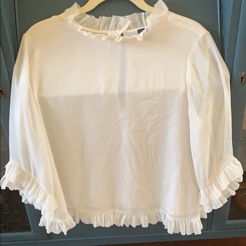 Ann Taylor off white ruffle detail top